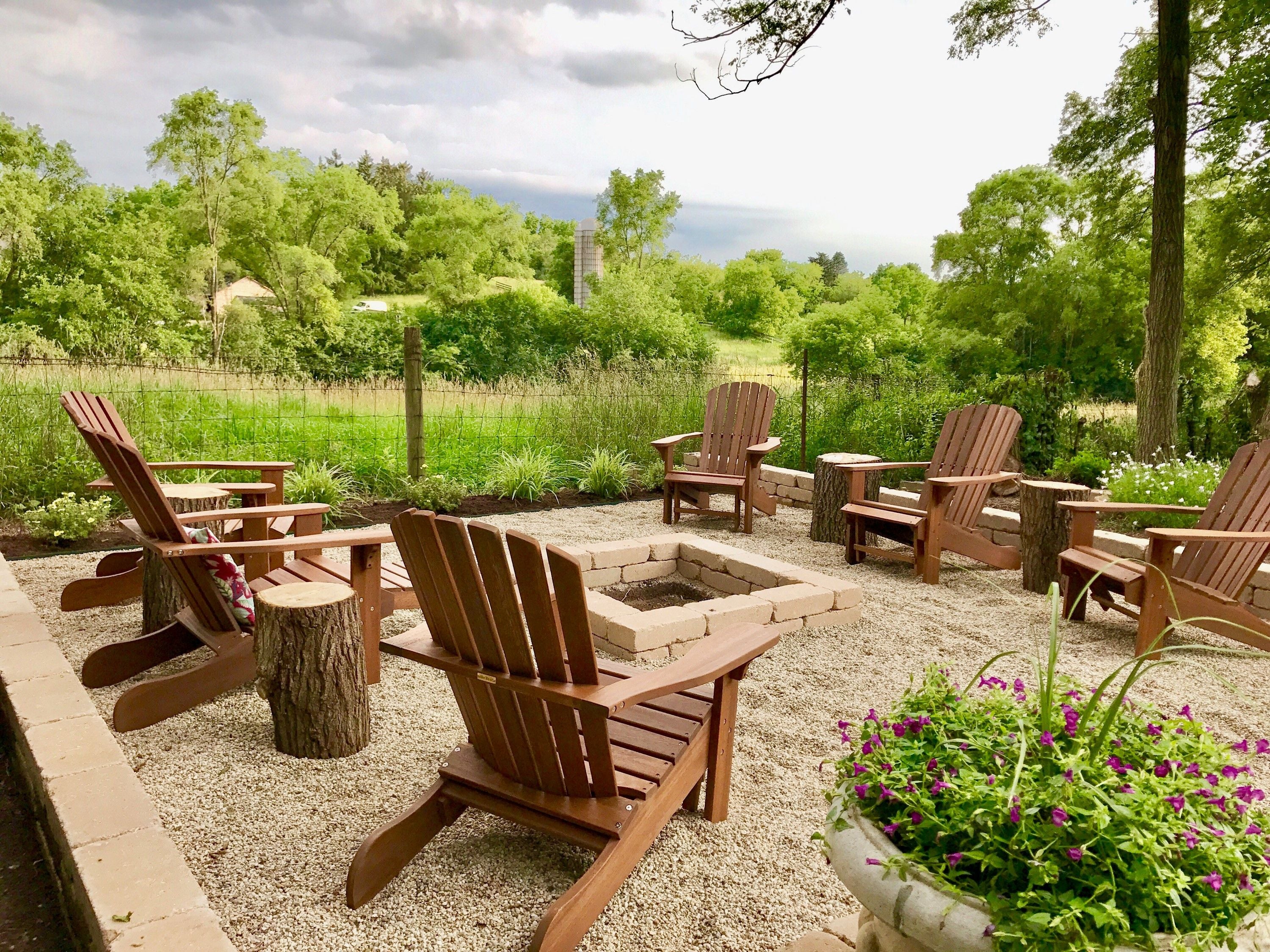 Pictured with additional Eucalyptus Adirondack Chairs with Built in Ottoman