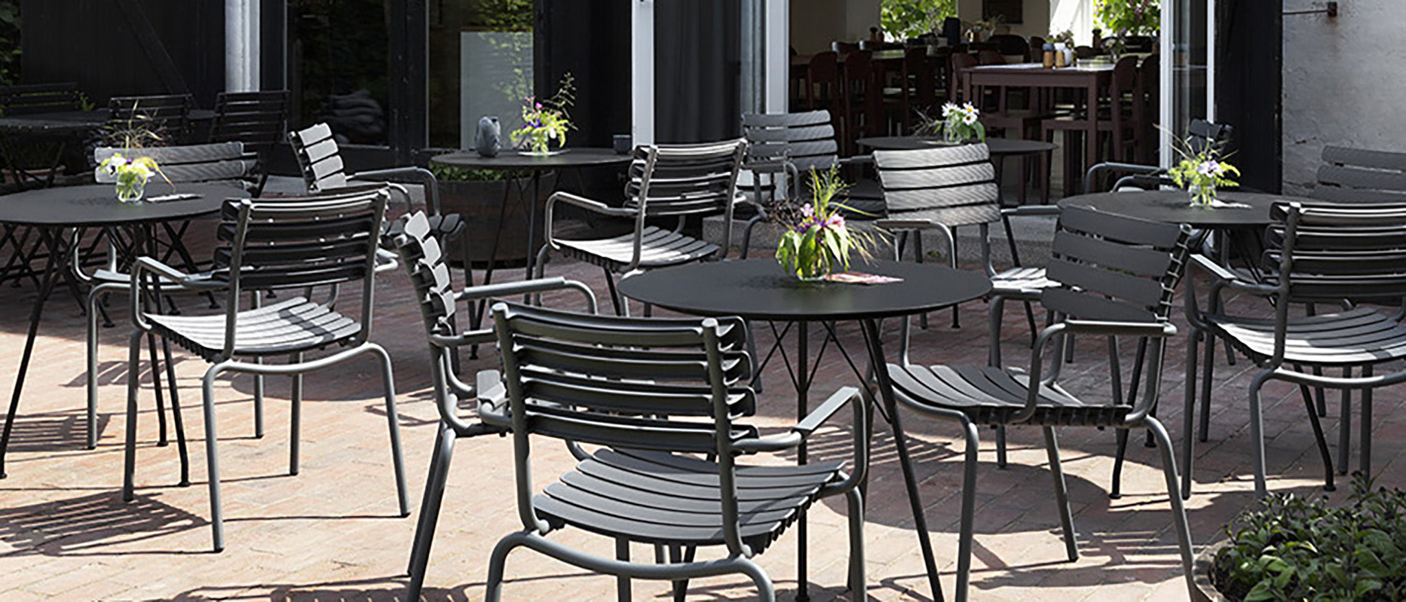 Circum Metal Cafe Table pictured with the Reclips Dining Armchair Item - HOU-22302 (sold separately)