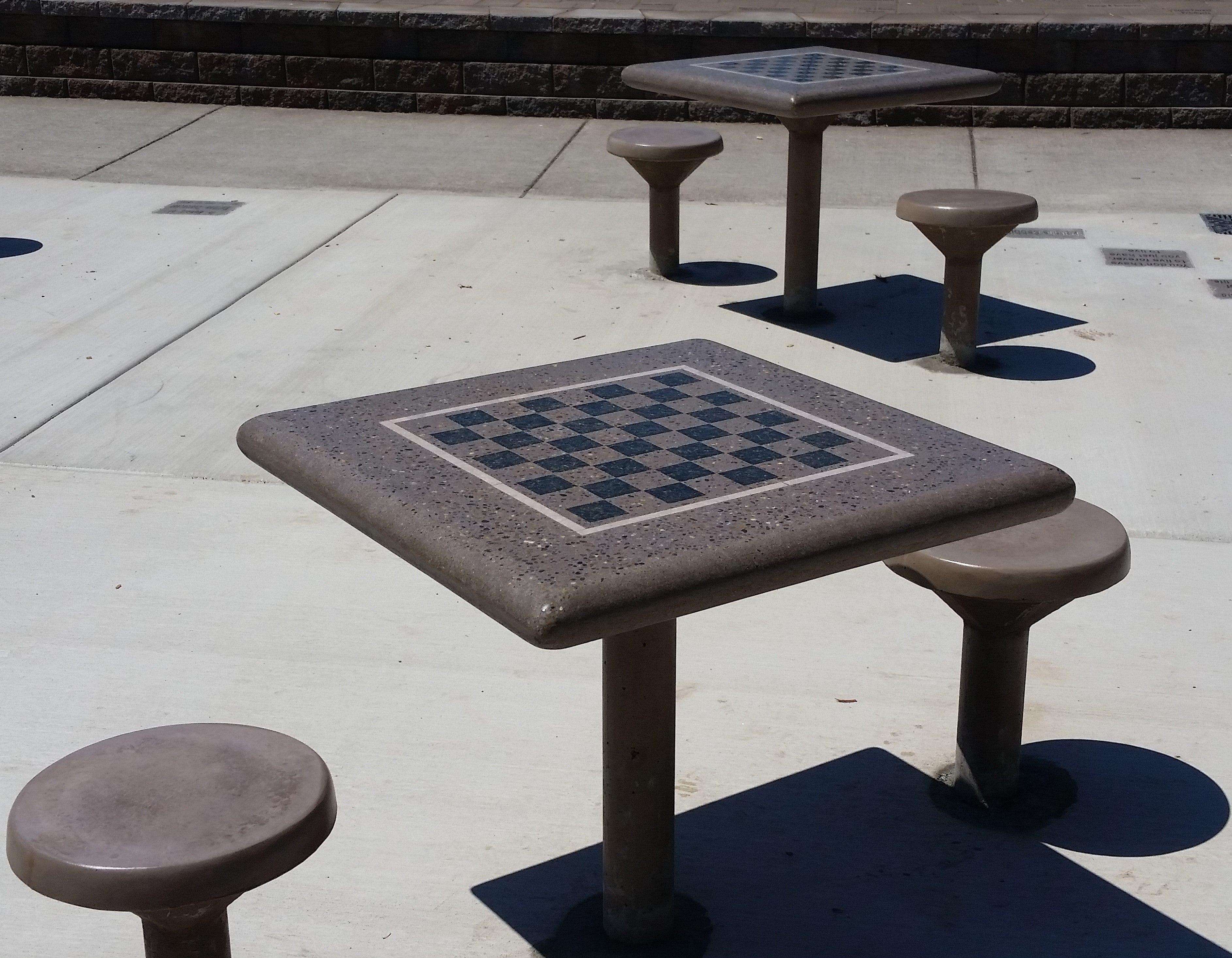 Stone Age Direct-Burial Chess Table with Optional Stools