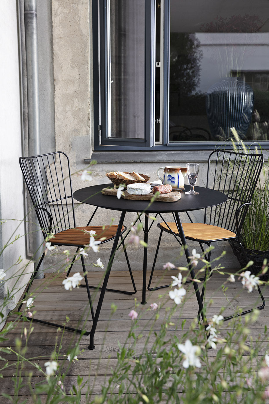 Circum Metal Cafe Table pictured with the Paon Dining Armchair Item - HOU-12801 (sold separately)